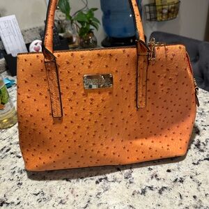 Bebe orange tote bag